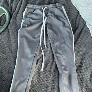 Grey track pants
